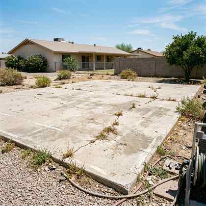 Unused concrete pad before a multi-sport court overlay